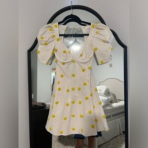 For love and lemons mini dress. White with yellow polka dot!
